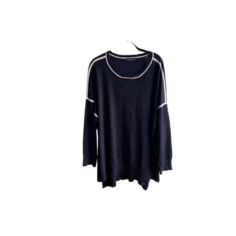 Grace The perfect fit, black and white long sleeve knit sweater. 